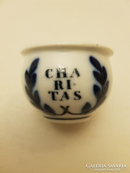 Antique porcelain pharmacy vessel. Cobalt blue charitas inscription. With decorative elements on the back.19th century.