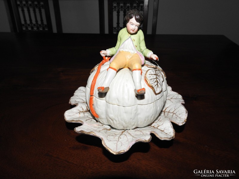 Antique figural bonbonier - little boy sitting on a giant pumpkin