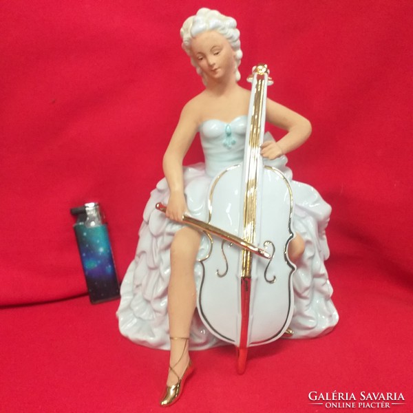 German, germany lippelsdorf wagner & aple cello woman porcelain figurine.