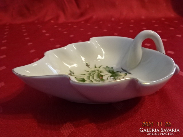 Ravenhouse porcelain centerpiece with green pattern. He has!
