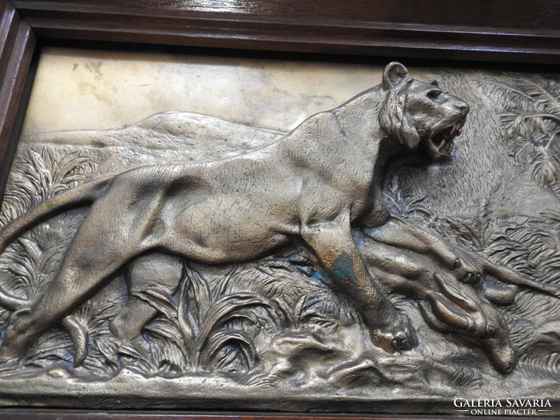 Antique bronze mural: a lion killing a gazelle _ bronze sculpture in a wooden frame