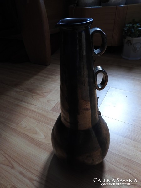 Iridescent eosin glazed ceramic vase: ceramic chris vase / damaged