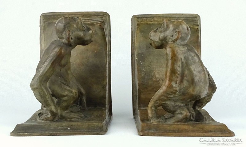 1G700 recessed art deco ceramic monkey book support pair from the 1930s