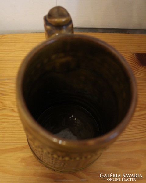 Brown ceramic jug