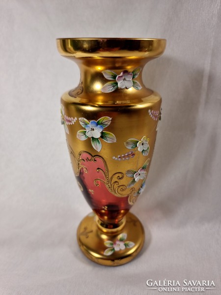 Bohemian red amphora in enameled gold-painted glass vase.