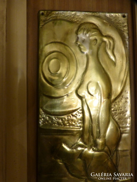 Mural, girl with a jug - gilded metal.