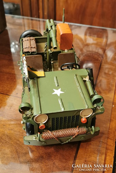 Model of an American military jeep with a submachine gun and a rocket launcher