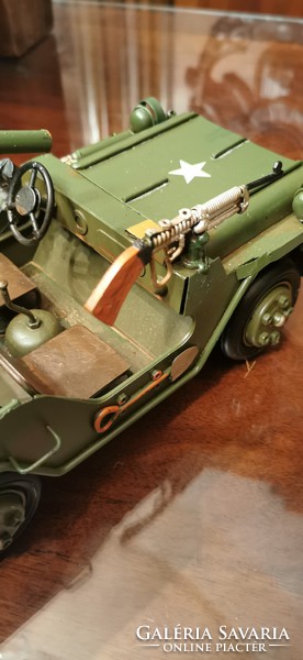 Model of an American military jeep with a submachine gun and a rocket launcher