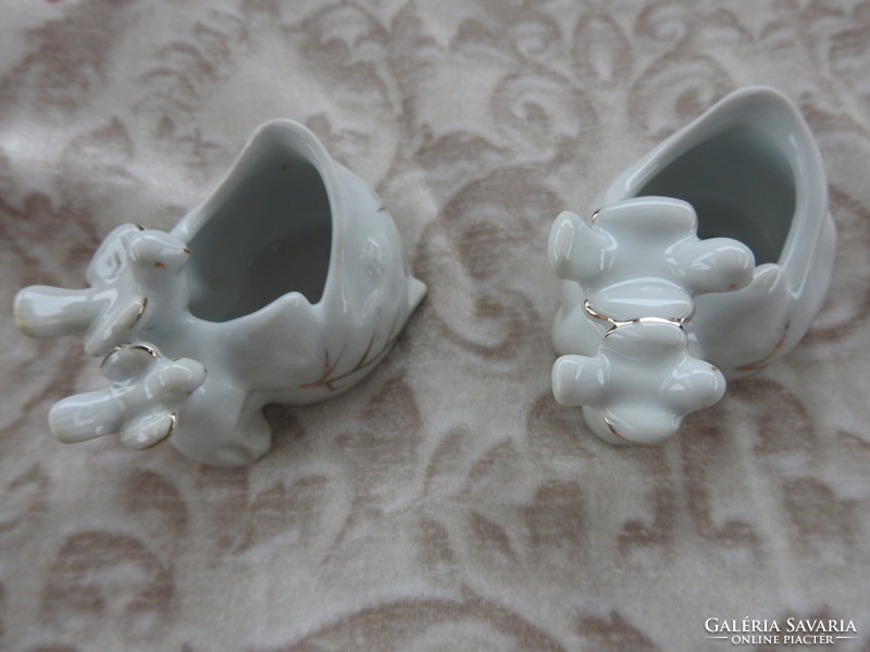 Pair of porcelain jewelry holders holding old wedding rings