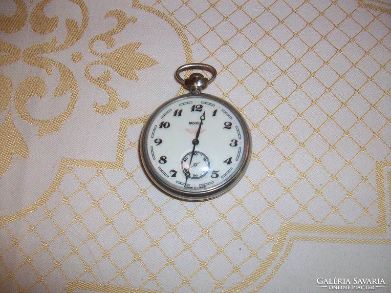 Molnija's old nice pocket watch with a locomotive on the back