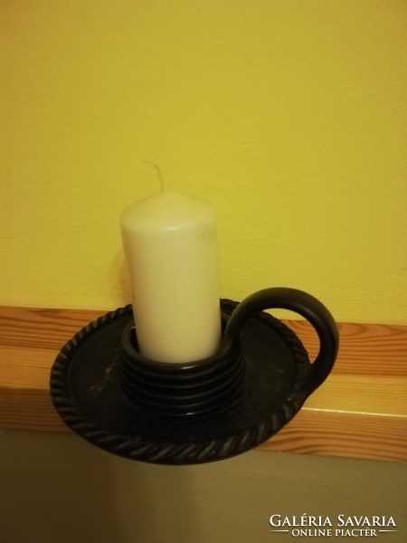 Ceramic candlestick with candle