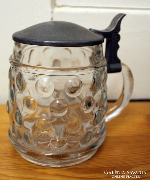 Glass jar with tin top