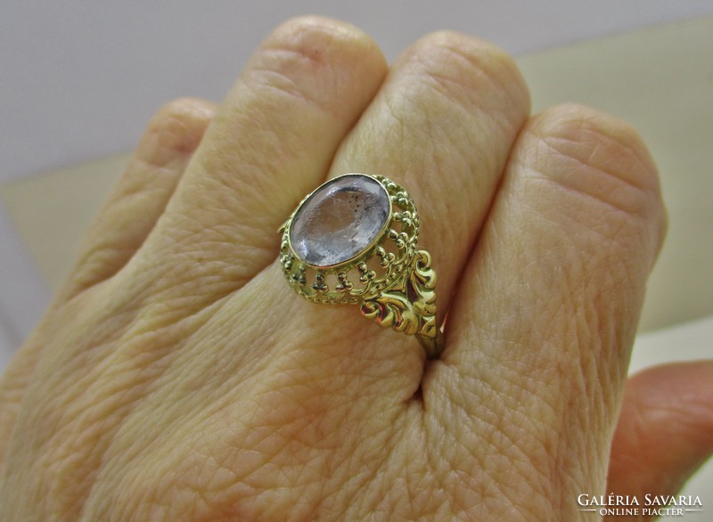 Beautiful old gold ring with white stone