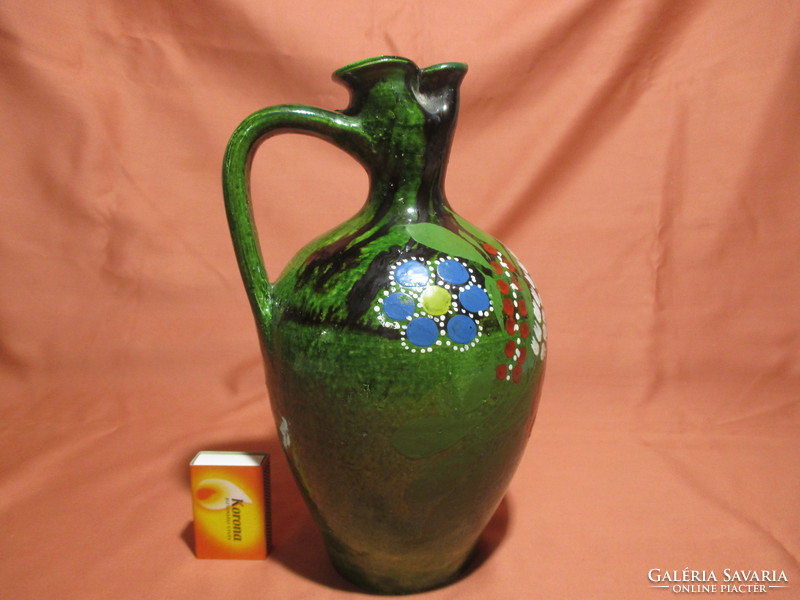 Old green floral rattle jug and pitcher