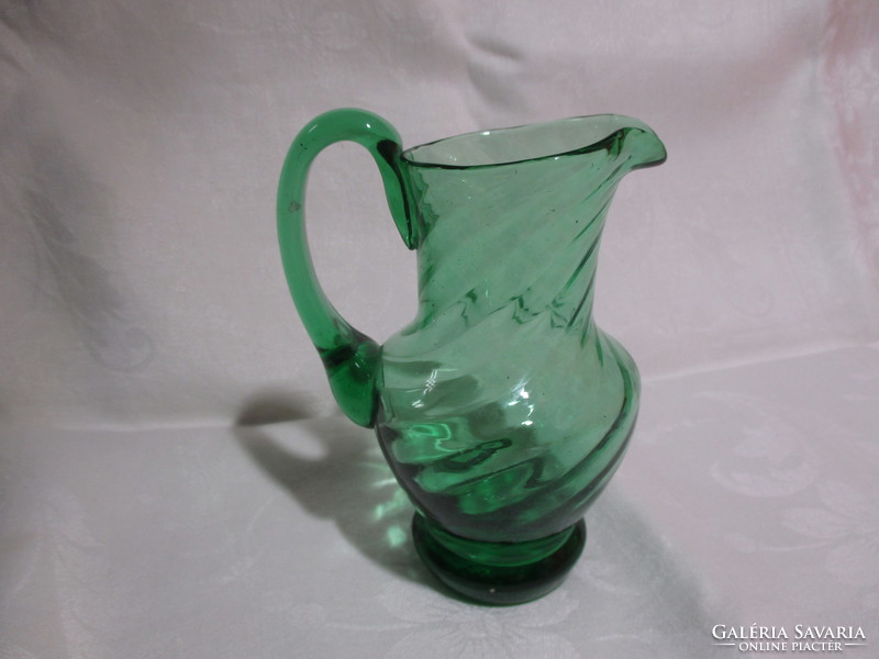 Small green glass jug