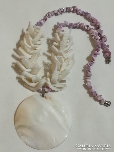 Necklace made of snails and shells with a large pendant