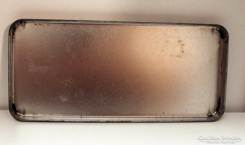 Old metal box with the inscription butlers at the bottom