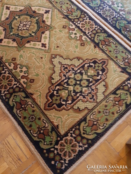 Machine in green and orange tones from the legacy of Persian carpets