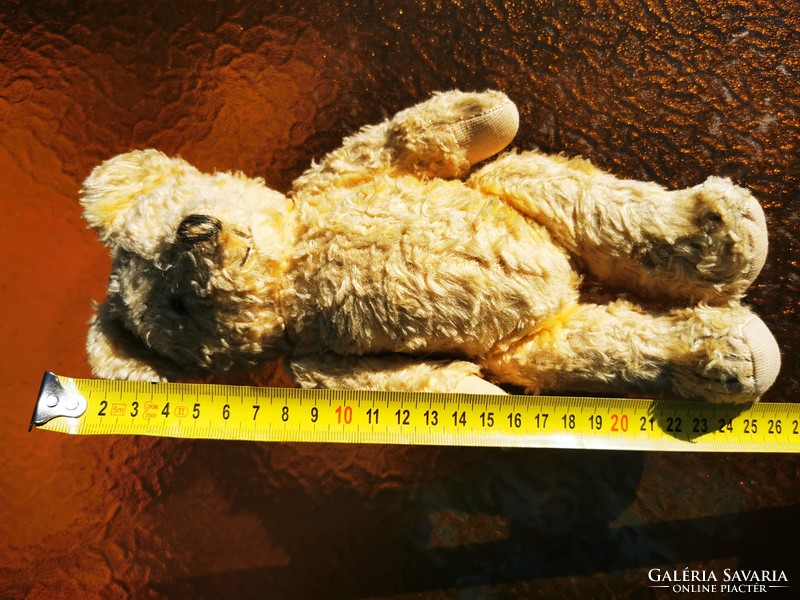 Antique straw teddy bear