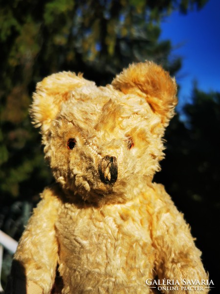 Antique straw teddy bear