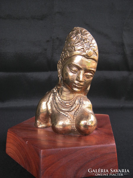 Copper female bust