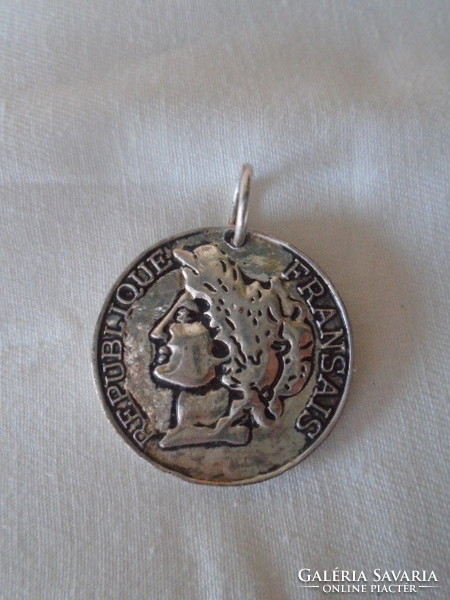 Coin pendant in silver?