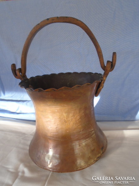 Old copper kettle, pot with cast iron handles