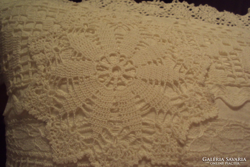 Vintage decorative pillow with antique lace appliqué.