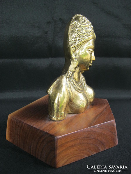 Copper female bust