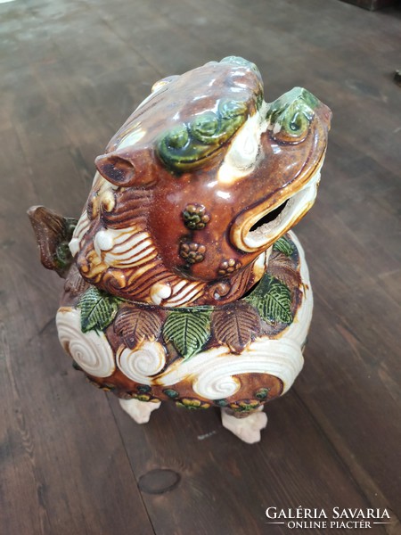 Porcelain incense holder foo dog from China.