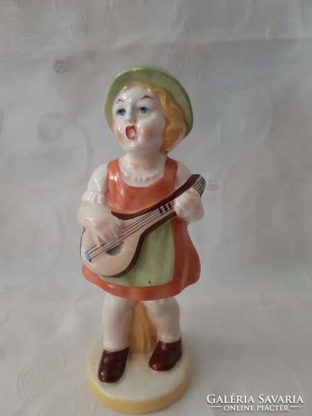 Hand painted ceramic singing little girl with mandolin