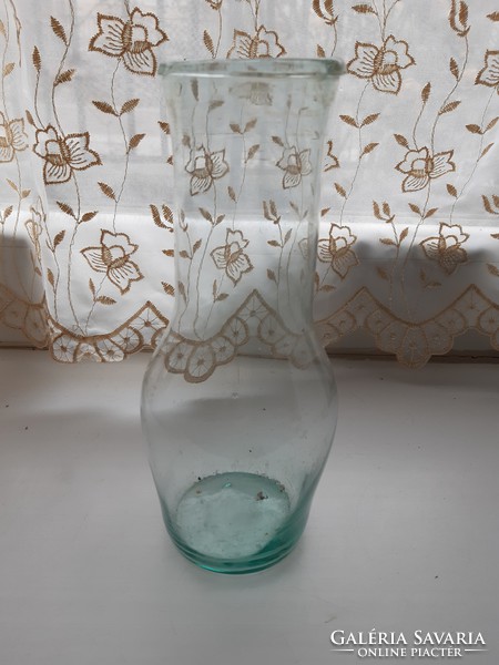 Blown teal glass bottle