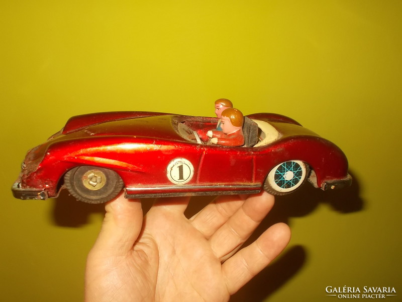 Old flywheel toy toy car