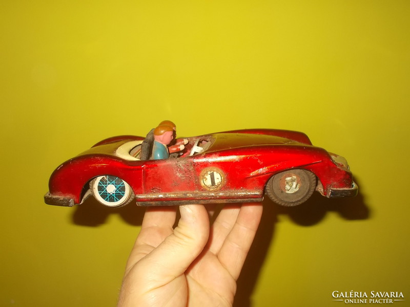 Old flywheel toy toy car