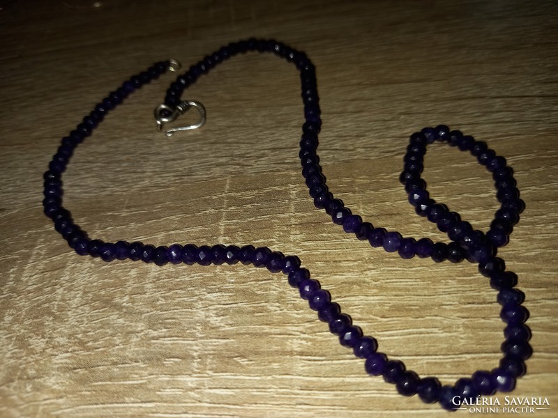 Genuine amethyst faceted bead row with silver clasp