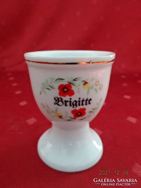 German porcelain egg holder with brigitte inscription. Its height is 6.5 cm. He has!