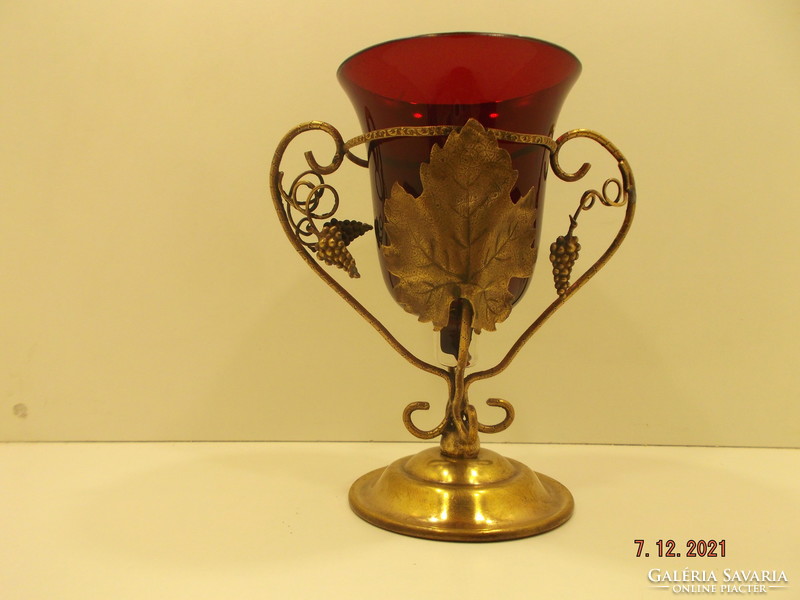 Old copper holder with glass insert. Ornament glass, chalice