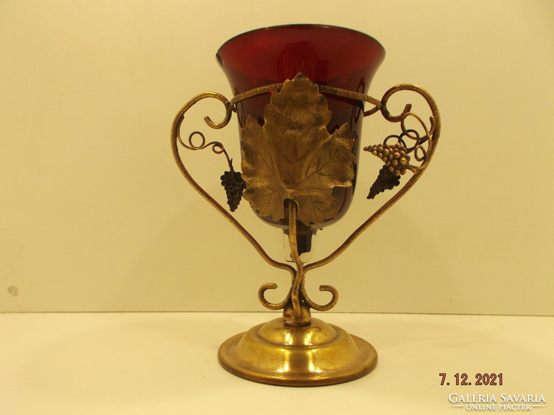 Old copper holder with glass insert. Ornament glass, chalice