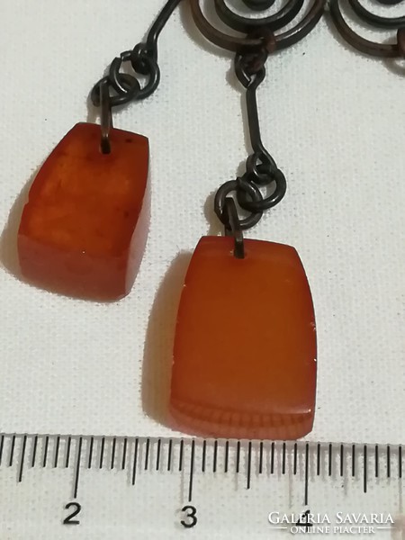 Antique chain with a pendant decorated with amber.