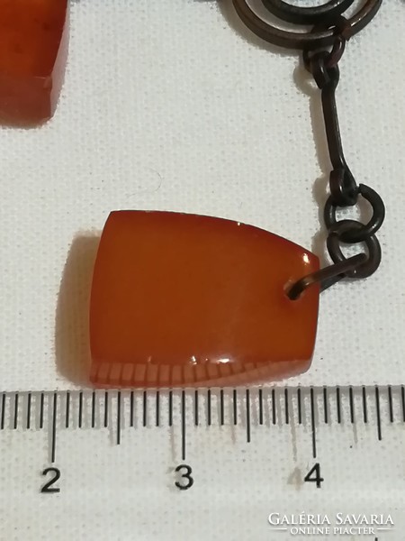 Antique chain with a pendant decorated with amber.