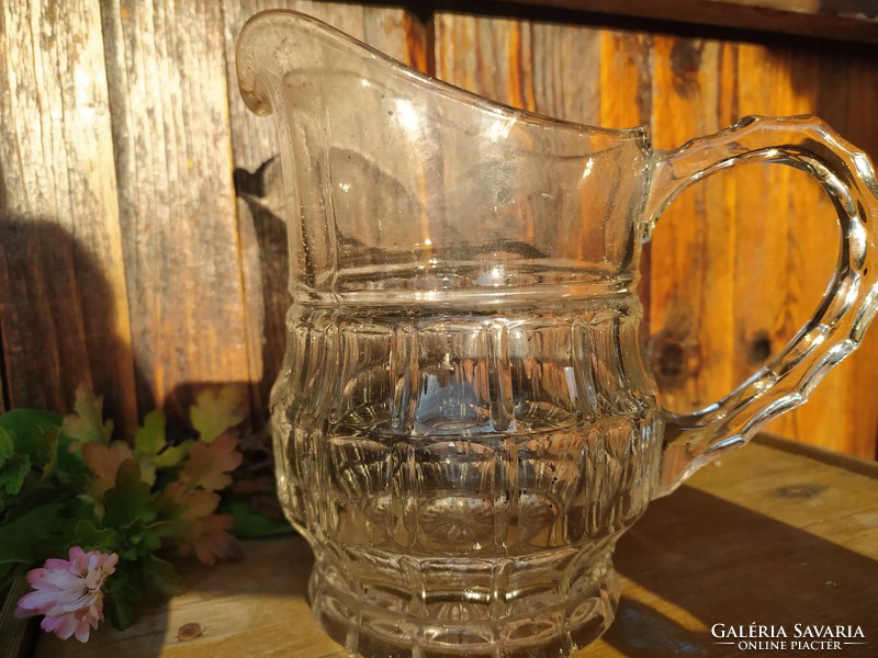 Nice lined old glass pitcher pouring