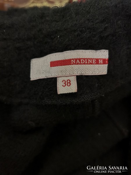 Nadine h 38 with 60% wool ruffled elongated cardigan pocket.