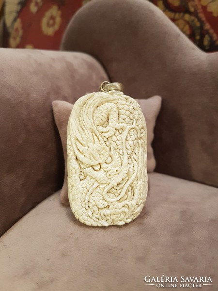 Bone pendant with a depiction of a dragon