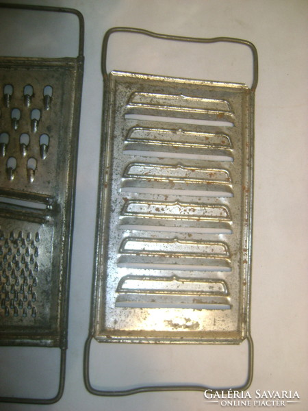 Two pieces of grater - retro kitchen utensil