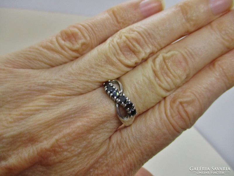 Beautiful silver ring with polished onyx stones