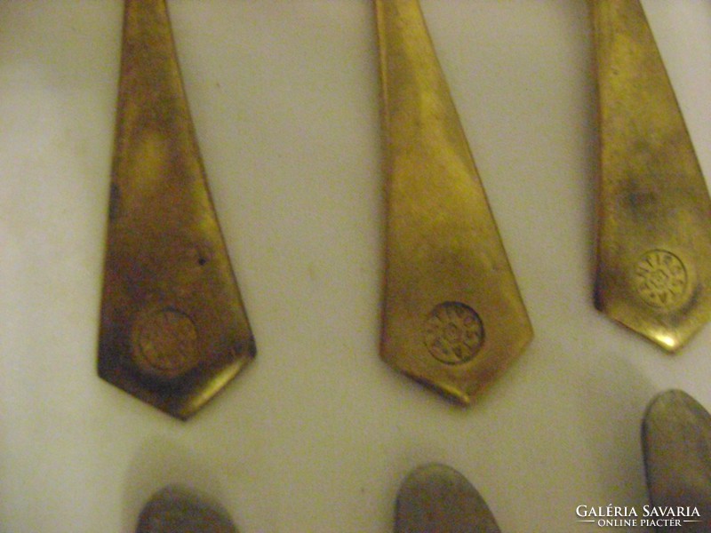 Old, marked cutlery made of copper