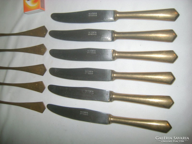Old, marked cutlery made of copper