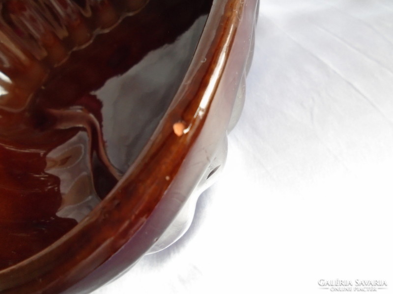 Heart-shaped marked glazed ceramic baking dish.