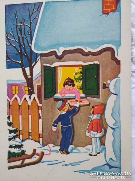 Régi grafikus karácsonyi képeslap, gyerekek, szánkó, ajándék, hóember 1950-es évek körüli