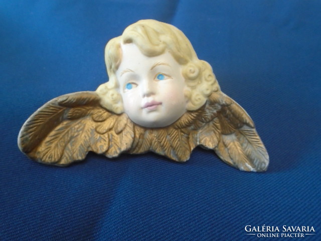 Porcelain angel is a very old piece